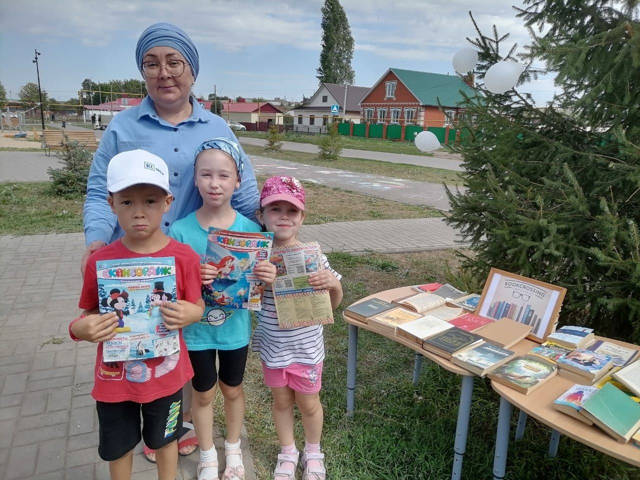 С 14 июля по 10 августа библиотечная система провела мероприятия в парках района «Книга под открытым небом»